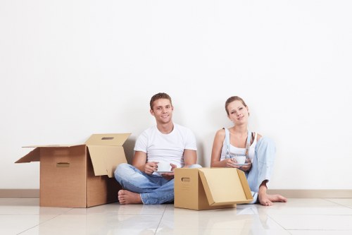 A smooth moving day scene for Frognal removals with organized boxes and transport